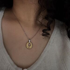 Elegant Gold and Silver Pendant Necklace